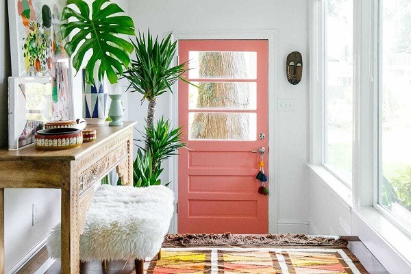 An entryway with indoor plants