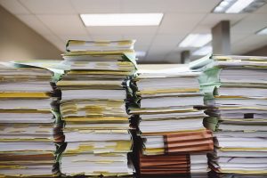 Office files stack on-top of each other in piles