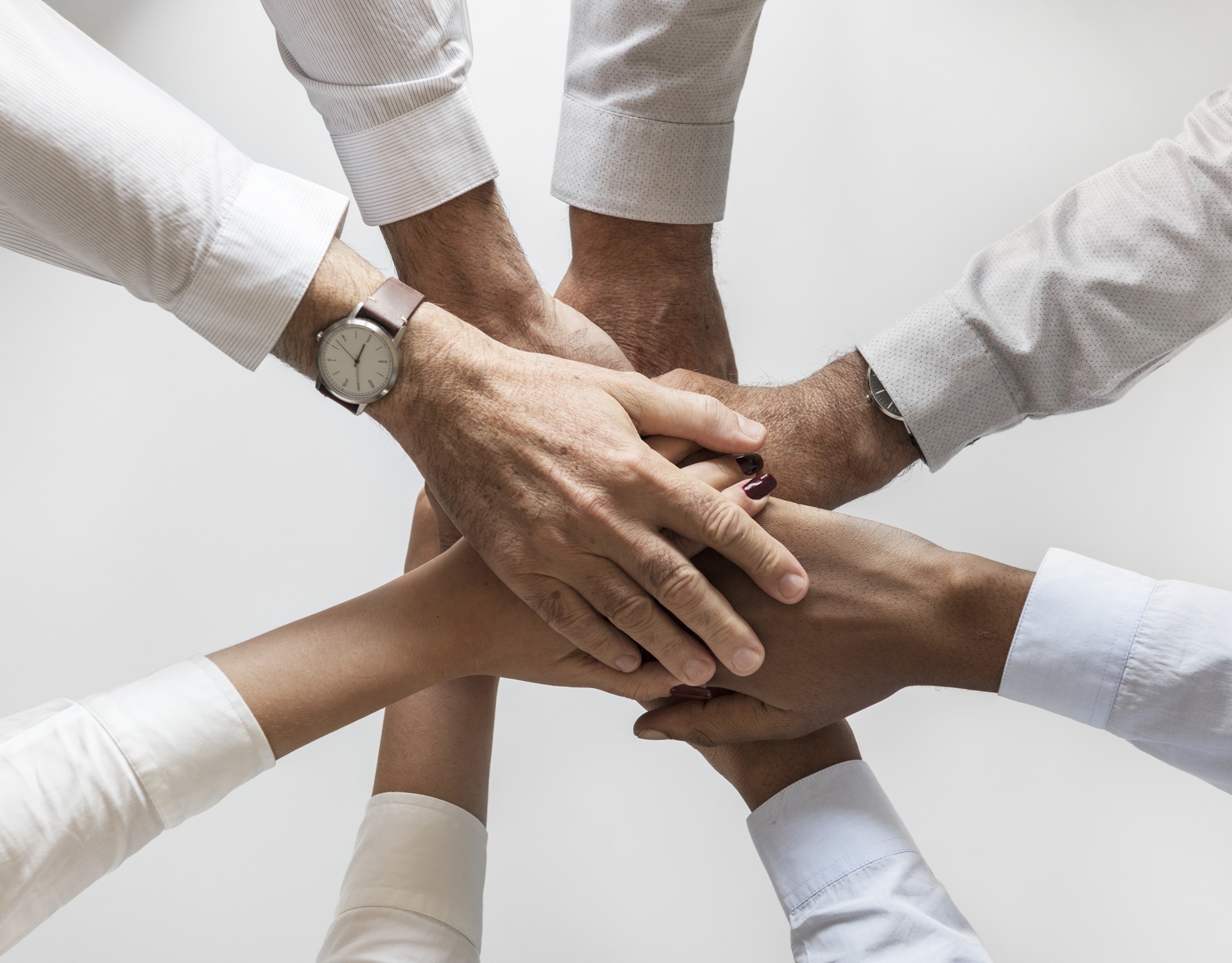 business hands joined together teamwork